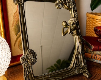 1920s–30s Art Nouveau Figural Brass Vanity Mirror with Red Velvet Back