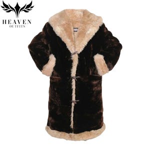 May include: A long, dark brown faux fur coat with a light brown faux fur collar, cuffs, and trim. The coat has toggle closures and a hood. The "HEAVEN OUTFITS" logo is in the upper left corner.