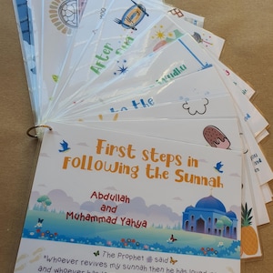 May include: A colourful illustrated book titled "First steps in Following the Sunnah" by Abdullah and Muhammad Yahya. The book features a quote from the Prophet Muhammad: "Whoever revives my sunnah then he has loved me and whoever has loved me will be with me in paradise." The quote is attributed to Anas bin Malik.