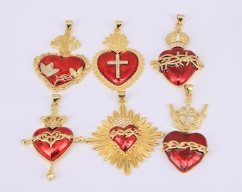 May include: Six gold-toned heart pendants with red enamel. Designs include crosses, crowns, and flames. Some pendants feature intricate details and sparkling accents. Religious-themed jewelry.