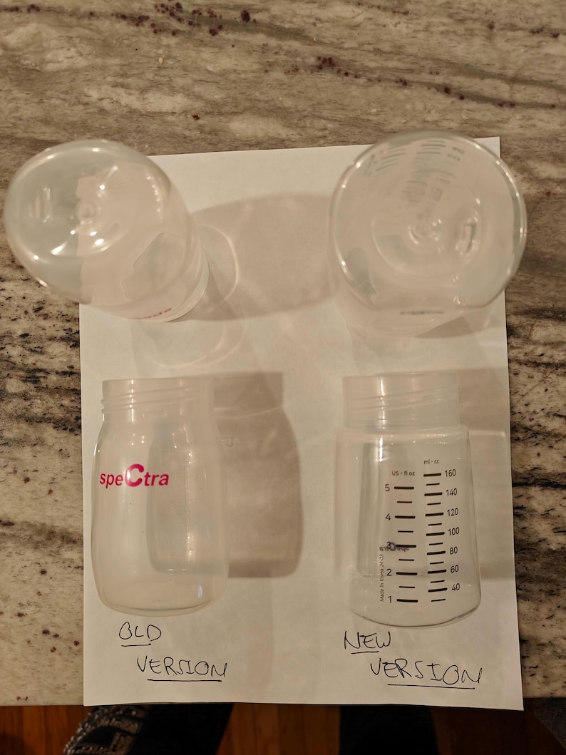 This photo is provided to help you figure out what version of the bottle you have. The new wide mouth type is shown on the right. It is flattened on one side. The old version is shown on the left. It is more symmetrical and like an oval in shape.