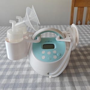 Spectra S1 Plus / S2 Plus Breast Pump bottle holders and tube holder add-on.