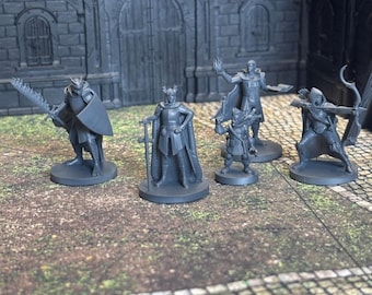 May include: Five miniature figurines of fantasy characters, painted in a gray color. The characters include a knight, a warrior, a wizard, a rogue, and an archer. The figurines are standing on a gray and brown surface.