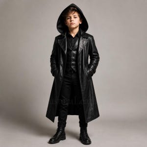 May include: A black leather trench coat with a hood, worn over a matching black button-up vest and black trousers. The ensemble is completed with black leather boots. The coat features a long silhouette, wide lapels, and long sleeves.