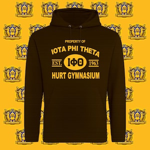 May include: A dark brown hoodie with the text "PROPERTY OF IOTA PHI THETA EST. 1963 HURT GYMNASIUM" in gold. The background is yellow with a repeating pattern of a blue and gold emblem.