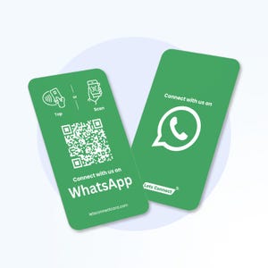 Op de afbeelding: Twee groene kaarten met witte tekst en afbeeldingen. Eén kaart zegt "Tap" en "Scan" met een QR-code en "Connect with us on WhatsApp". De andere kaart zegt "Connect with us on" en toont het WhatsApp-logo.