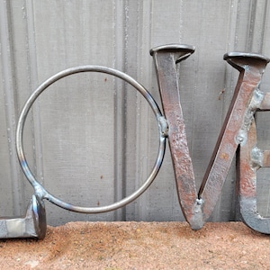 railroad spike love art