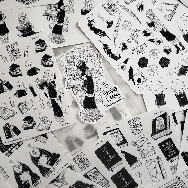 May include: A set of black and white stickers featuring illustrations of books, ghosts, and a woman reading a book. The stickers are part of a collection called "The Haunted Library Sticker Collection".