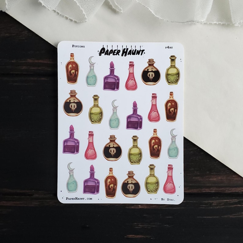May include: A sheet of stickers featuring 20 colorful potion bottles with various designs, including skulls, moons, and stars. The stickers are labeled "Potions" and "Paper Haunt."