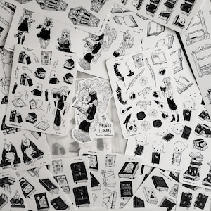 May include: A set of black and white stickers featuring a spooky library theme. The stickers include illustrations of books, ghosts, ravens, and a girl reading a book. The text "The Haunted Library Sticker Collection" is printed on one of the stickers.
