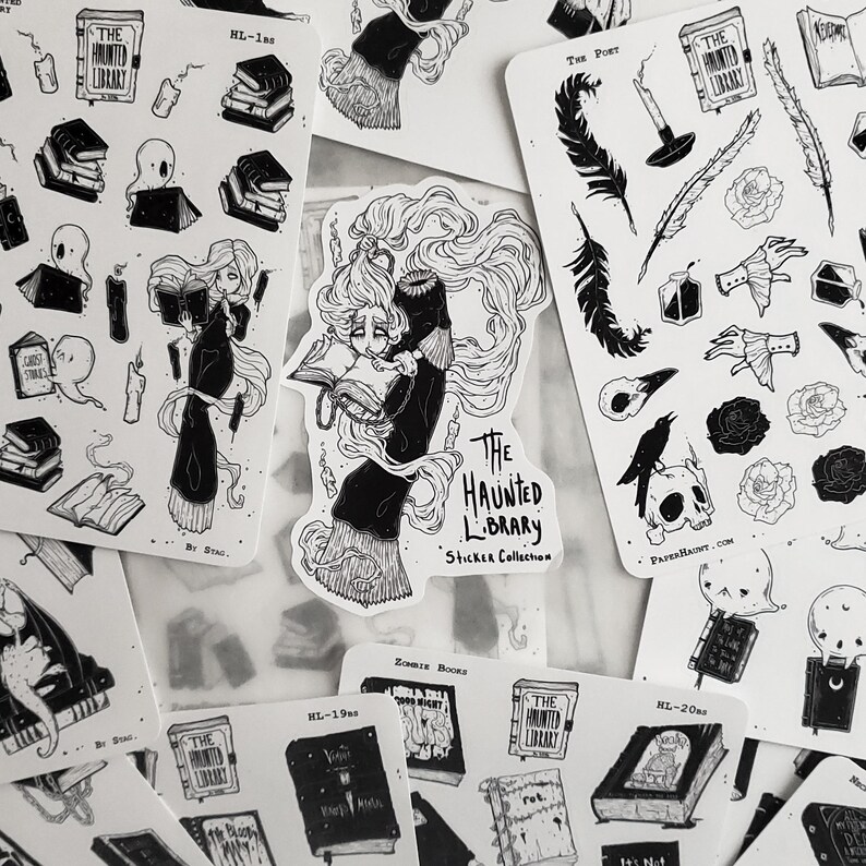 May include: A set of black and white stickers featuring illustrations of books, a skull, a raven, and a woman reading a book. The stickers are part of a collection called "The Haunted Library Sticker Collection".