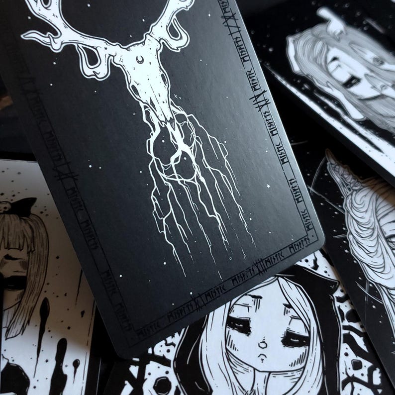 May include: Black and white illustration of a deer skull with antlers, surrounded by a black background with white text that reads "MISTIC MOSFETS MISTIC MPPT MISTER MISFITS XY MEYTT MINPITY 1/X MIS".
