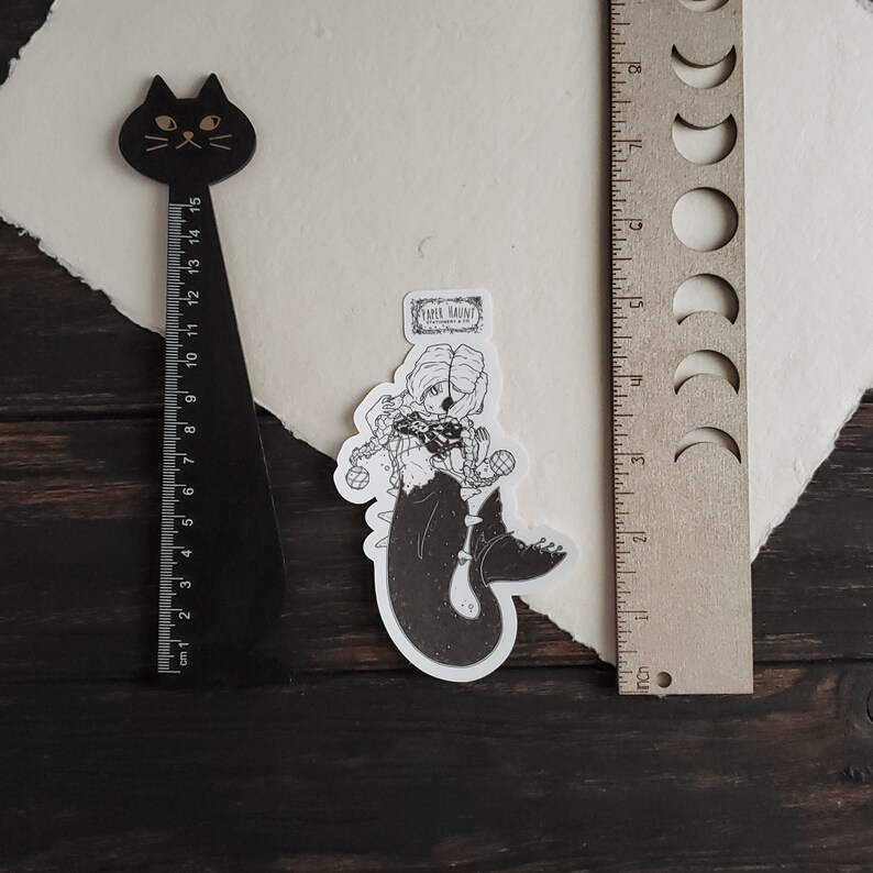 Size reference of Gothic pirate mermaid sticker by artist White stag for Paper Haunt Stationery & Co