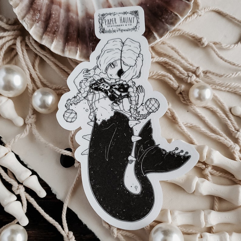Sticker pictured with pearls Gothic pirate mermaid sticker by artist White stag for Paper Haunt Stationery & Co