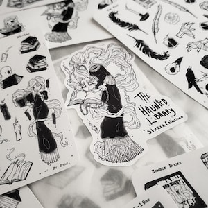 May include: A black and white sticker sheet featuring a spooky illustration of a ghost reading a book in a haunted library. The sticker sheet includes the text "The Haunted Library Sticker Collection" and the artist's signature "By Stag."