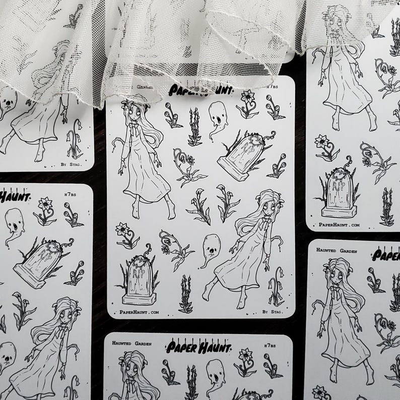 May include: A set of four black and white sticker sheets featuring a spooky garden theme. The stickers include a ghost, flowers, a tombstone, and a girl in a white dress. The text on the sticker sheets reads "Paper Haunt" and "Haunted Garden".