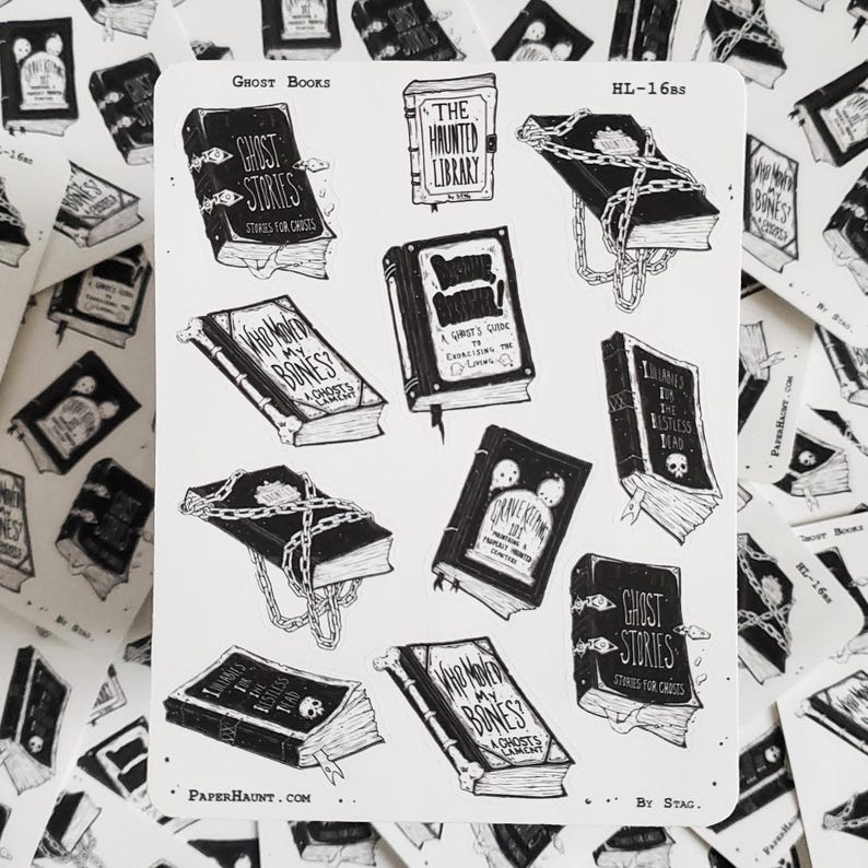 May include: A sheet of stickers featuring black and white illustrations of books with spooky titles like "The Haunted Library", "Who Moved My Bones?", and "Illusions in the Restless Dead". The stickers are part of a collection called "Ghost Books" by Stag.