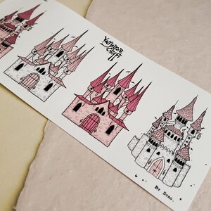 May include: A sheet of stickers featuring four different illustrations of pink and white castles with black outlines. The stickers are labelled "Vampires Craft" and "...By Stag..."