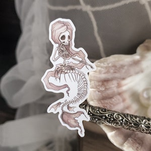 detail of fishbones creepy cute mermaid skeleton sticker