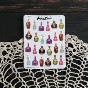 May include: A sheet of stickers featuring 20 illustrated potion bottles in various colors, including purple, green, pink, and brown. The stickers are labeled "Potions" and "Paper Haunt."