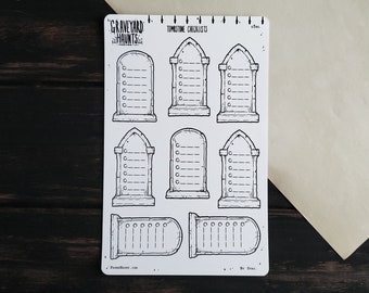 May include: A sheet of black and white tombstone checklist stickers. The stickers feature a variety of tombstone designs with blank spaces for writing. The text "GRAVEYARD HAUNTS" and "TOMBSTONE CHECKLISTS" is printed at the top of the sheet.