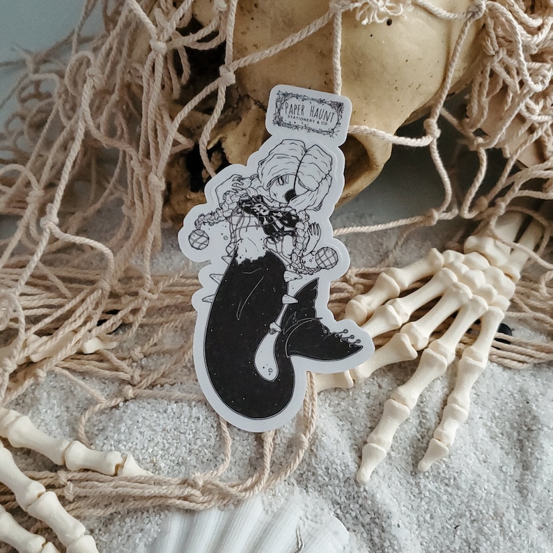 Gothic pirate mermaid sticker by artist White stag for Paper Haunt Stationery & Co with a skull and skeleton hands.