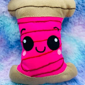 Hot Pink sewing spool cushion with cartoon face, plush sewing spool, embroidery gift, Kawaii gift, crafters gift, plush bobbin, craft gift