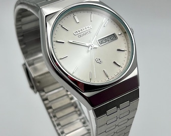 1997 Vintage Mens Citizen 6101-915097 Quartz White Dial and Integrated Bracelet Watch