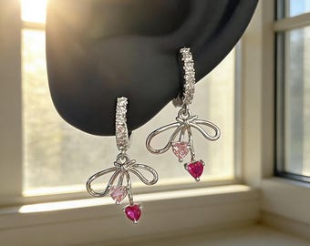 Kolczyki z kokardką z kryształkami, cyrkonią w kształcie serca, stalą tytanową