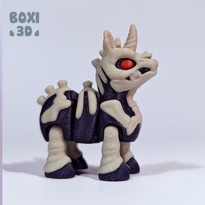 May include: A small, white skeletal unicorn figurine with a black body and red eyes. The figurine is made of plastic and has a detailed design.