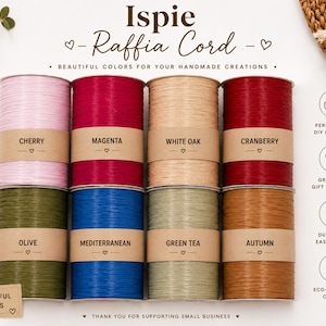 May include: Spools of raffia cord in eight colors, including cherry, magenta, white oak, and cranberry. The image includes text that reads "Beautiful Colors for Your Handmade Creations." The spools are labeled with their color names and are suitable for DIY projects and gift wrapping.