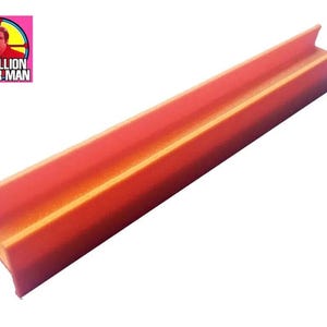 May include: Orange and red plastic track piece for a toy racing car set.