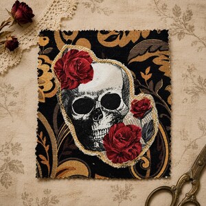 May include: A rectangular fabric patch featuring a black and gold damask pattern background. A central applique shows a white human skull with deep black eye sockets, adorned with three vibrant red roses and outlined in a gold metallic thread.