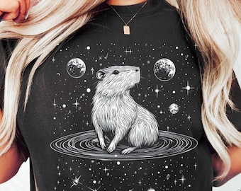 Camiseta espacial de capibara, regalo divertido de capibara, camiseta celestial adorable, camiseta con meme de capibara, regalo para ella, ropa unisex para mujer, atuendo de capibara