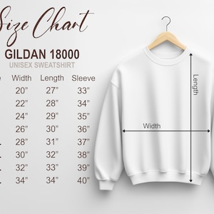 May include: A white Gildan 18000 unisex sweatshirt hanging on a wooden hanger. The image includes a size chart with measurements in inches for width, length, and sleeve length, ranging from size small to 5XL.