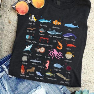 a t - shirt with different types of sea animals on it
