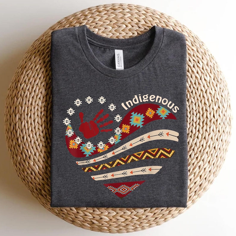 a t - shirt with a design on it sitting on a basket