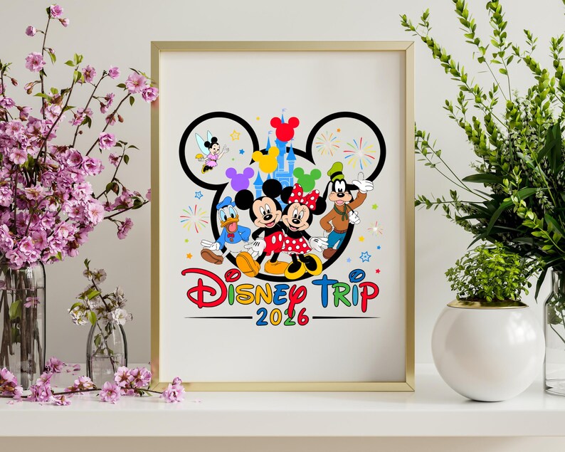 May include: A framed print featuring Disney characters Mickey and Minnie Mouse, Donald Duck, and Goofy. The design includes a Disney-themed logo with the text "Disney Trip 2026" in colorful lettering, set against a white background.