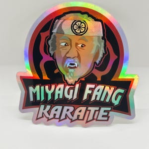 Kobra Kai / Miyagi Do Karate 5 inch holographic vinyl stickers. This is a custom design made for Kobra Kai & Karate Kid fans.