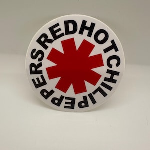 Red Hot Chili Peppers Rock band custom vinyl sticker. Water resistant and UV resistant. Size- 5 inch’s in size.
