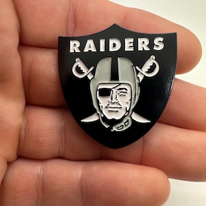 Custom 1.5 inch enamel pin. Raiders design, high quality and very detailed.