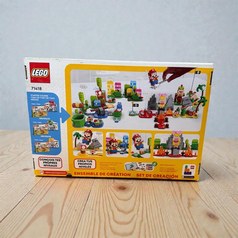 May include: A LEGO Super Mario Starter Course box set. The box is yellow and white, with images of the set's contents, including Mario figures, obstacles, and environments. Text on the box includes "LEGO", "71418", and "Starter Course".