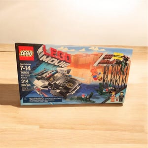 LEGO Lego Movie 70802 The LEGO Movie Bad Cop’s Pursuit - 314 Pieces (New Sealed, Retired) Rare Set Includes Collapsible Bridge & Minifigures