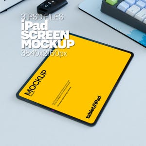 May include: A yellow iPad mockup with a black frame, showing a blank screen. The text "tablet//iPad" is visible on the bottom right corner of the screen. The text "MOCKUP" is visible on the top left corner of the screen. The text "3.PSD FILES" is visible at the top of the image. The text "iPad SCREEN MOCKUP" is visible below the text "3.PSD FILES". The text "3840x2160px" is visible below the text "iPad SCREEN MOCKUP".