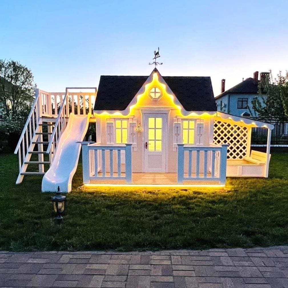 Two-Story Wooden Kids Playhouse with Terrace and Slide and Sandbox for outdoor use. Children's playhouse, playroom