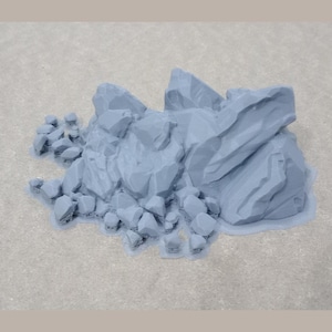 Puede incluir: Una formación rocosa gris impresa en 3D con una superficie irregular y dentada. La roca está compuesta por muchas piezas más pequeñas que están conectadas entre sí.