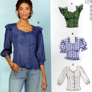 May include: A sewing pattern envelope featuring a blue long-sleeve button-down top with a square neckline and ruffled shoulders. The illustration shows three additional variations: a green floral top, a blue gingham top, and a white polka dot top.