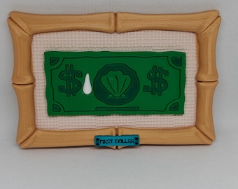 First dollar sign with painting drop and smiley