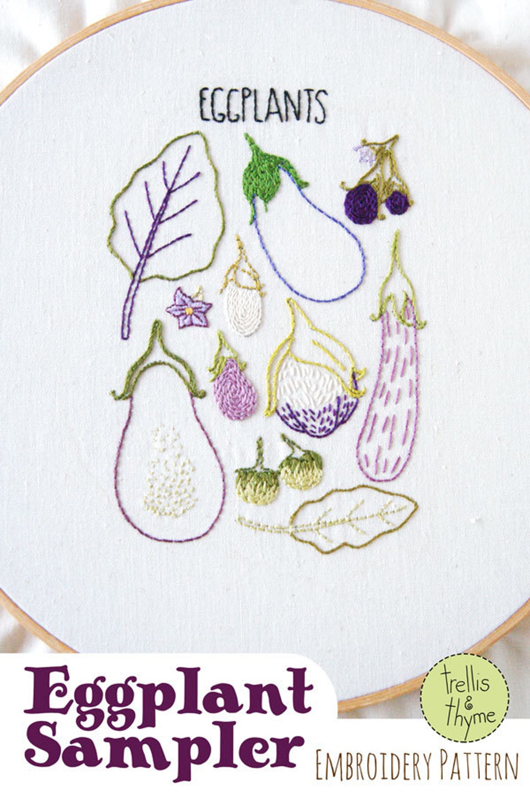 EGGPLANT FLORAL DESIGN WITH CORD EMBROIDERY ON A MESH LACE-SOLD BY YARD.