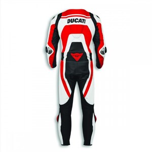May include: A Ducati racing suit in white, red, and black. The suit features the Ducati logo on the back and protective padding on the shoulders and knees. The suit is designed for motorcycle racing and is made of leather.